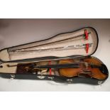 A CASED REPRODUCTION STRADIVARIUS VIOLIN