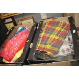 TWO TRAYS OF VINTAGE 1960S CLOTHING COMPRISING MOSTLY SKIRTS