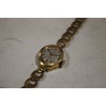 A LADIES 9CT GOLD ARMAC WRIST WATCH