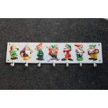 ***A CAST IRON SEVEN DWARVES CUP RACK