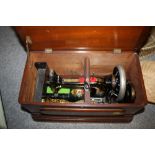 A CASED VINTAGE SEWING MACHINE