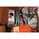 A BOX OF CAMERAS TO INCLUDE A VINTAGE GB-BELL AND HOWELL, HALINA ETC.