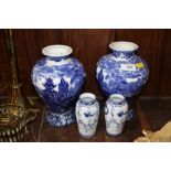 A PAIR OF WEDGWOOD BLUE AND WHITE BALUSTER VASES TOGETHER WITH A SMALL PAIR OF BLUE AND WHITE VASES