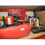 A CASED HILTI PRO LASER LEVELLER AND STAFF PLUS A LASER LINER