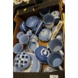 A TRAY OF POWDER BLUE JASPERWARE TO INCLUDE MUGS, FLOWER HOLDER, VASES ETC.