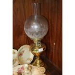 A VINTAGE OIL LAMP WITH DUPLEX BURNER