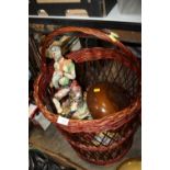 A WICKER LOG BASKET AND CONTENTS TO INCLUDE A TREEN FRUIT BOWL, RETRO LIGHTSHADE ETC.
