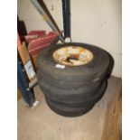 FOUR TRAILER WHEELS