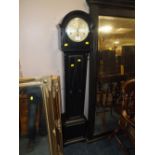 AN OAK CASED GRANDMOTHER CLOCK