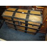 A DOMED BANDED PACKING TRUNK