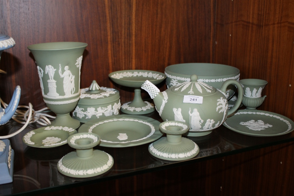 A SELECTION OF TWELVE PIECES OF GREEN WEDGWOOD JASPERWARE TO INCLUDE A TEAPOT, FRUIT BOWL ETC