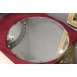 A ROUND DECO STYLE MIRROR