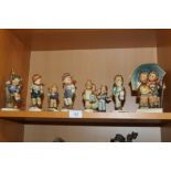 A SELECTION OF GERMAN FIGURES OF CHILDREN, TO INCLUDE "GLOBE TROTTER", "LITTLE HIKER", APPLE TREE