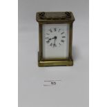 A BRASS CARRIAGE CLOCK