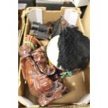 A BOX OF COLLECTABLES to include feather fan, carved Oriental figure, brass money box, cameras etc.