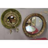 AN UNUSUAL DECORATIVE MIRROR WITH BRASS SCONCES, TOGETHER WITH A PORT HOLE STYLE MIRROR