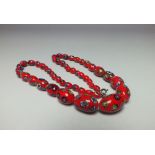 A VENETIAN / MURANO MILLEFIORE GLASS BEAD NECKLACE CIRCA 1920, the single strand of graduated bead