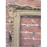 A 19TH CENTURY GILTWOOD AND PIERCED PICTURE FRAME, 91 X 58 cm A/F¦Condition Report:With loss