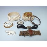 A COLLECTION OF MOSTLY VINTAGE COSTUME JEWELLERY, to include a vintage bangle with inset carved cor