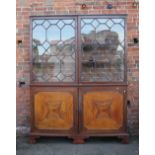 A LARGE 19TH CENTURY MAHOGANY CHIPPENDALE DESIGN GLAZED BOOKCASE, the twin door Astragel glazed upp