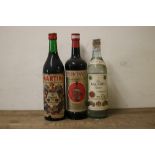 TWO BOTTLES OF DUBONNETT 30% PROOF, 1960S / 1970S BOTTLING, together with 1 x Martini Rosso 30% pro