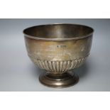 A HALLMARKED SILVER FOOTED BOWL BY WILLIAM HUTTON AND SONS LTD - LONDON 1895, having typical half f