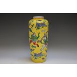 A CHINESE YELLOW GROUND VASE, decorated with acrobats and animals amongst flowers and clouds, A/F,