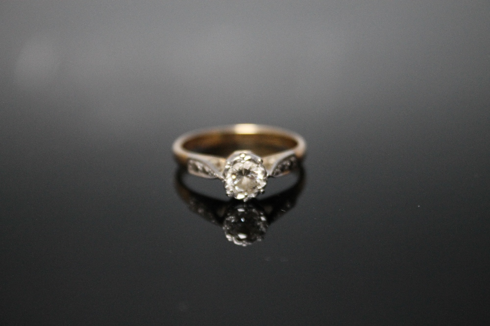 AN 18CT AND PLATINUM DIAMOND SOLITAIRE RING, set with a brilliant cut diamond of approx 0.20 carat, - Image 2 of 2