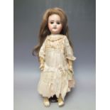 AN SFBJ JUMEAU BISQUE HEADED DOLL, impressed marks to back of head, sleeping eyes, composite joint