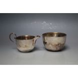 A HALLMARKED SILVER CREAM JUG AND SUGAR BOWL BY GEORGE MAUDSLEY JACKSON & DAVIVD LANDSBOROUGH FULLE