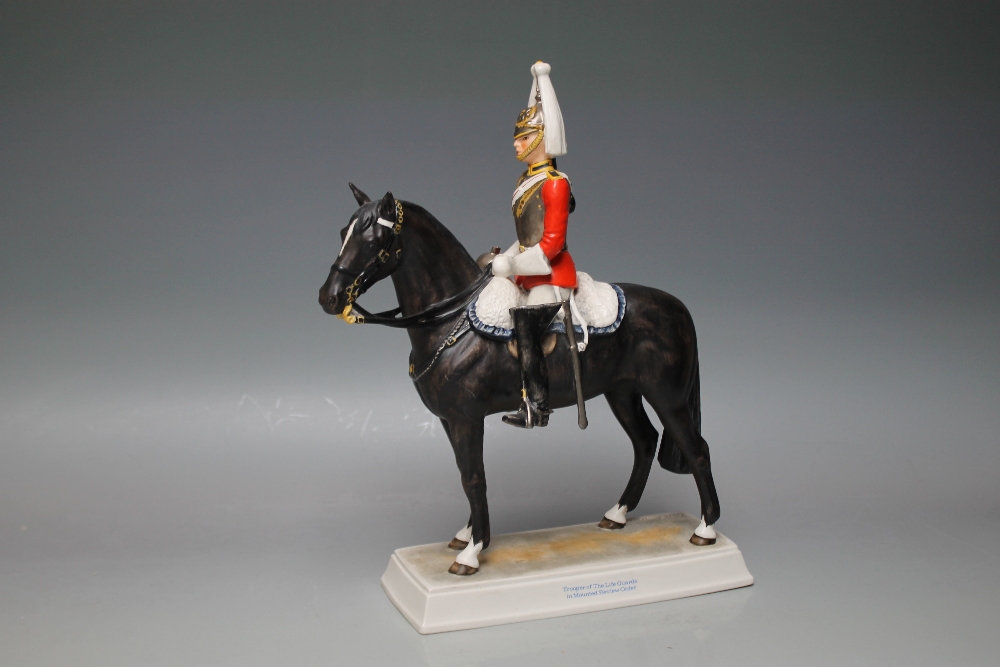 A GOEBEL TROOPER OF THE LIFE GUARDS IN MOUNTED REVIEW ORDER, signed 'Bochmann' to the base, A/F, H