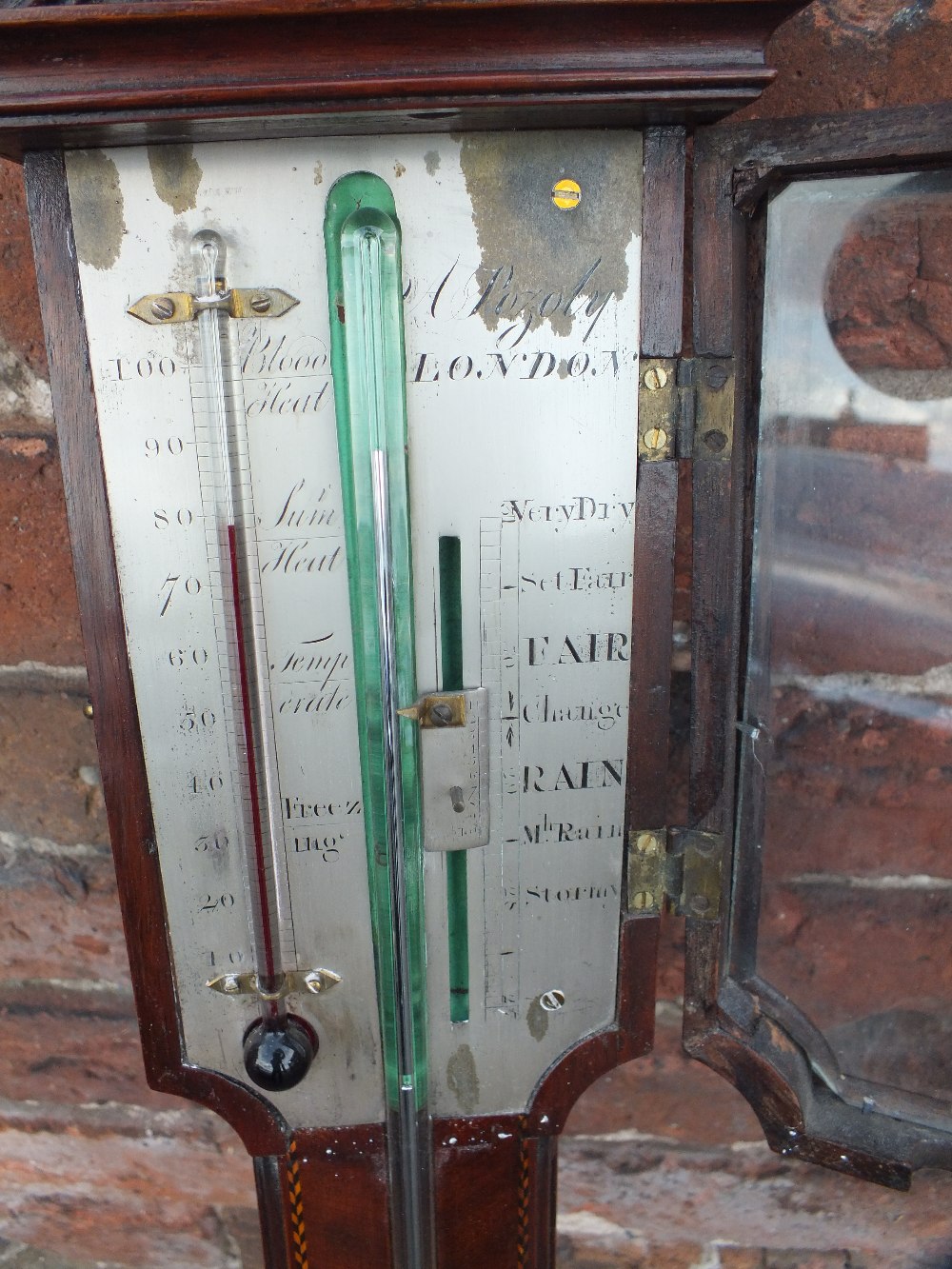 A 19TH CENTURY MAHOGANY STICK BAROMETER BY A POZOLY - LONDON, with swan neck pediment over an engra - Image 4 of 4