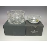 A WATERFORD CRYSTAL MILLENNIUM CHAMPAGNE BOTTLE COASTER, Dia. 13.2 cm, together with a Waterford Cr