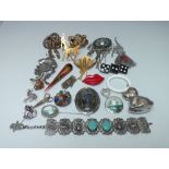 A COLLECTION OF MODERN AND VINTAGE COSTUME JEWELLERY, comprising mostly brooches, to include silver