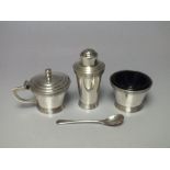 AN ART DECO SILVER THREE PIECE CRUET, marked silver to the base, makers marks for J.K., together wi