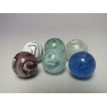 A COLLECTION OF SIX VINTAGE ART GLASS MARBLES, various colours and patterns to include ribbon effec