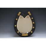 A NOVELTY BEVEL EDGED HORSE SHOE MIRROR, H 33 cm