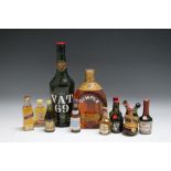 A COLLECTION OF WHISKY CONSISTING OF 1 VINTAGE BOTTLE OF DIMPLE WITH WIRE SEAL, 1 bottle of VAT 69