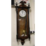 A DOUBLE WEIGHT WALNUT AND EBONISED CASED WALLCLOCK, H 59 cm