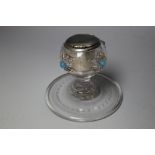 AN UNUSUAL GLASS AND SILVER PLATED INKWELL, with four light blue dot and shell applied decoration,