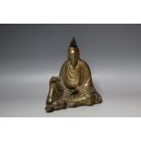 A GILT PATINATED CHINESE FIGURE OF A SEATED OFFICIAL IN HIGH PEAKED HAT AND FLOWERED ROBE, H 27.5 c