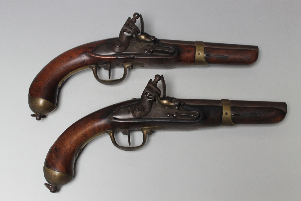 A PAIR OF 19TH CENTURY ANTIQUE BELGIAN FLINTLOCK PISTOLS, having mahogany stock, steel barrel with