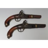 A PAIR OF 19TH CENTURY ANTIQUE BELGIAN FLINTLOCK PISTOLS, having mahogany stock, steel barrel with