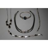 A COLLECTION OF MODERN SILVER JEWELLERY ITEMS, comprising a collarette, two bracelets, a bangle and