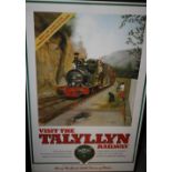 A RAILWAY POSTER 'VISIT THE TALYLLYN RAILWAY', framed and glazed, 100 x 61 cm
