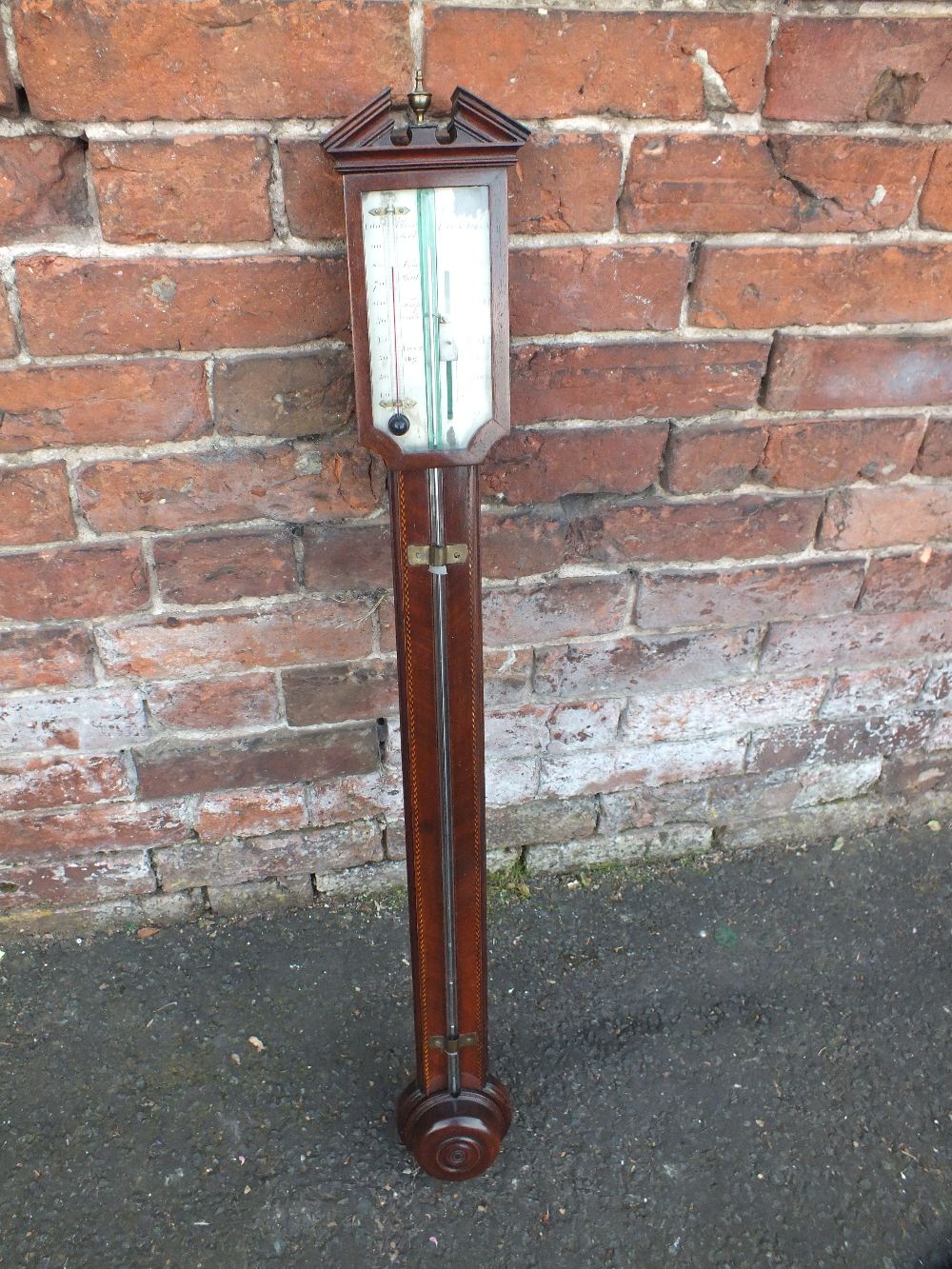 A 19TH CENTURY MAHOGANY STICK BAROMETER BY A POZOLY - LONDON, with swan neck pediment over an engra