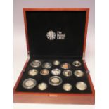 A CASED ROYAL MINT 2014 UNITED KINGDOM PREMIUM PROOF COIN SET IN FITTED CASE, complete with certifi