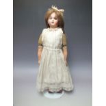 AN A & L LIMOGES BISQUE HEADED DOLL, impressed marks to back of head 'AL&Co. Limoges, France', comp