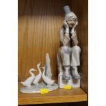 A LLADRO STYLE CLOWN, TOGETHER WITH A NAO GAGGLE OF GEESE