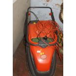 AN ELECTRIC FLYMO LAWN MOWER